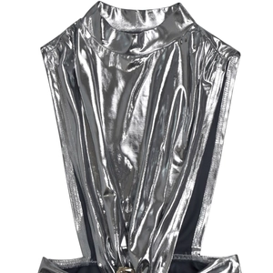 Detail of silver metallic high neck bodysuit featuring side cut-outs and metal ring details