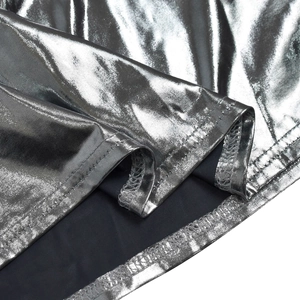 Close-up of silver metallic fabric with fine mesh texture and double-needle stitching