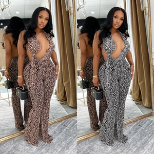 Sexy leopard print halter jumpsuit with deep V-neck and backless flared leg design