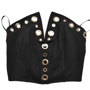 Detail of black V-neck tube top with decorative gold metal eyelets on white background