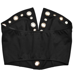 Detailed macro view of black tube top featuring decorative gold metal eyelets and fabric texture