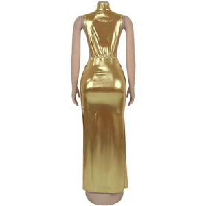 Detailed back view of a gold metallic maxi dress with halter neck and open back design