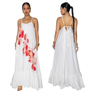Floral print backless maxi dress with spaghetti straps and ruffled hem in white