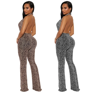 Detail of sexy leopard print halter neck jumpsuit showing brown and grey patterns