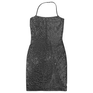 Close-up of black halter mini dress with square silver sequins and drawstring neck