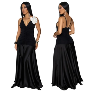 Elegant black satin slip dress for women featuring a large white 3D flower and V-neckline