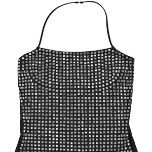 Detail of black halter dress with shimmering silver square sequins in a grid pattern