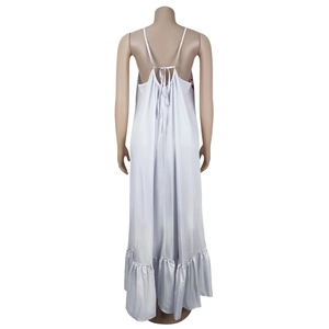 Detail view of white satin long dress featuring backless design with a delicate bow tie