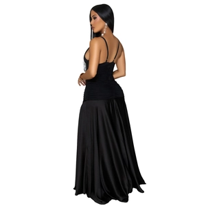 Detail view of the sleek black satin maxi dress featuring elegant ruching and thin straps