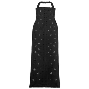 Close-up of black halter dress with detailed silver rhinestones and star beadwork