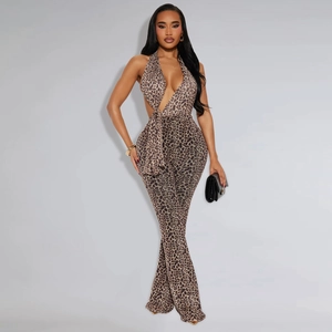 Detailed view of women's leopard print halter jumpsuit with sexy waist cut-out and flared legs