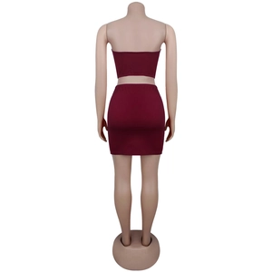 Detail view of wine red tube top and mini skirt set back showing knitted texture