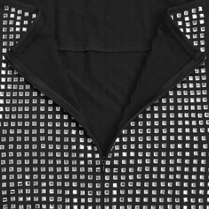 Detail of black halter dress featuring silver square studs and a hidden zipper closure