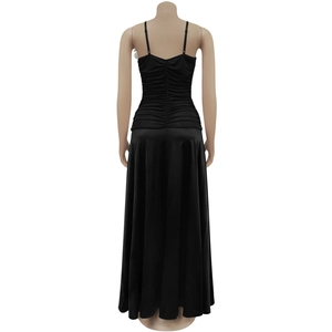 Detail of elegant black strapless dress featuring ruched bodice and silky satin skirt back