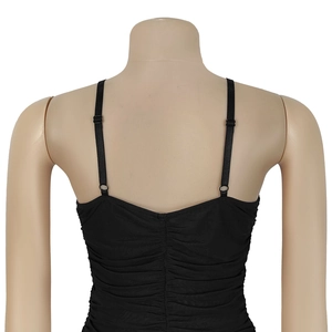 Detail view of the black camisole dress featuring pleated back and adjustable thin straps