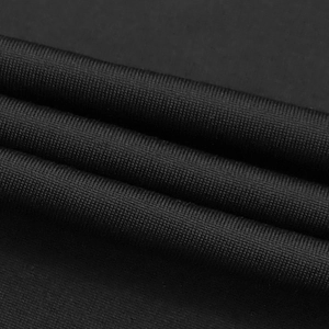 Macro view showing the high-quality black mesh fabric texture and fine grid patterns