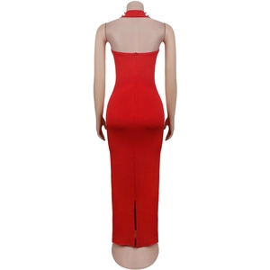 Detail view of the back of a red halter neck bodycon dress with beads and invisible zipper