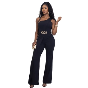 Detail of elegant black one-shoulder jumpsuit featuring a gold geometric buckle belt