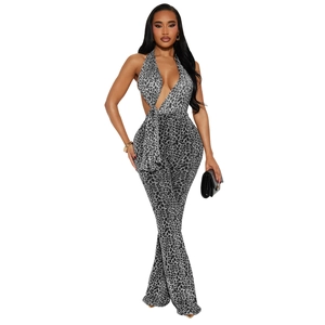 Detail of sexy leopard print jumpsuit with deep V-neck halter and backless design