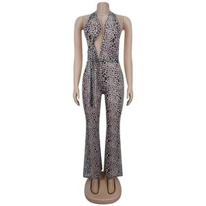 Detail of sexy leopard print halter neck jumpsuit with tie-up chest and open back design