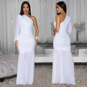 Detail of white one-shoulder mesh dress featuring ruched fabric and floor-length sheer hem