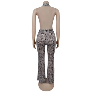 Detail view of the halter neck open back design on this leopard print jumpsuit