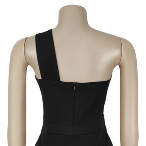 Detail view of the elegant black one-shoulder jumpsuit with back invisible zipper closure