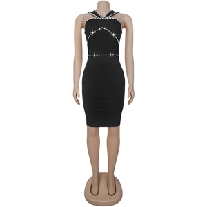 Detailed view of the sparkling rhinestones on a black halter neck bodycon dress