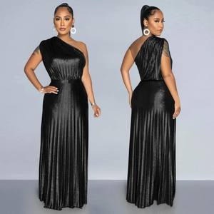 Detail of elegant black one-shoulder pleated maxi dress with metallic shimmering texture