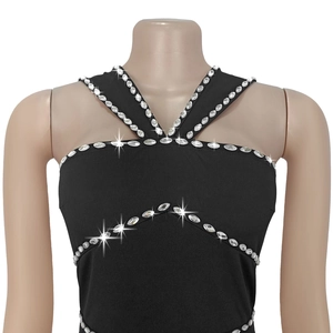 Detail of elegant black halter dress with luxury silver rhinestone embellishments