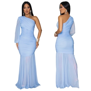Close-up of light blue one-shoulder dress with ruched fabric and sheer mesh fishtail hem