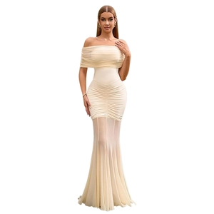 Detail of ruched mesh fabric and off-shoulder neckline on a beige slim bodycon dress