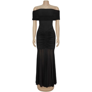 Detail of ruched black off-shoulder dress with elegant semi-transparent mesh mermaid hemline