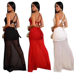 Detail of cross-straps backless design on pleated fishtail dresses in black red and white