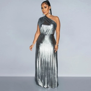Close-up of elegant silver metallic pleated dress with one-shoulder design and waist belt