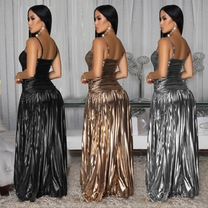 Elegant metallic pleated maxi dress in black, bronze, and silver with thin straps