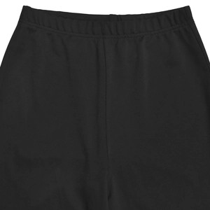 Detail view of the wide elastic waistband and fine stitching on these black pants