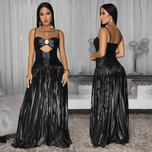 Detail of black metallic pleated maxi dress with spaghetti straps and cutout ring