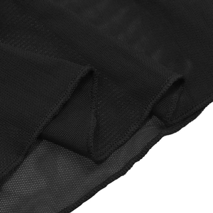 Detail of black mesh fabric showing breathable honeycomb texture and precise stitching lines