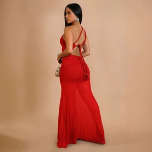 Detailed back view of red sexy evening gown with criss-cross lace-up straps and ruched mesh