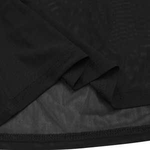 Close-up of black sheer mesh fabric detailing the fine texture and mesh structure of a dress