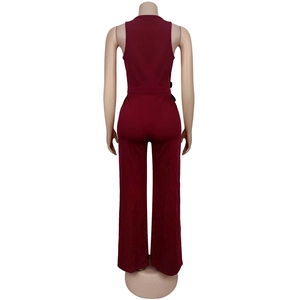 Rear view of wine red sleeveless V-neck jumpsuit with a waist belt and wide leg pants