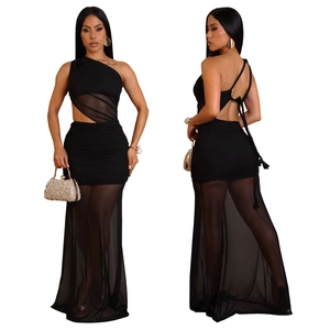 Detail of black one-shoulder dress with sheer mesh cut-outs and ruched skirt design