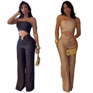Sleek women's bodycon set with bandeau top and cutout wide leg pants in black and gold