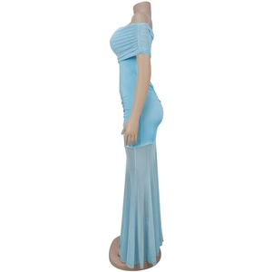 Detail of light blue off-shoulder dress with ruched bodice and sheer mesh skirt