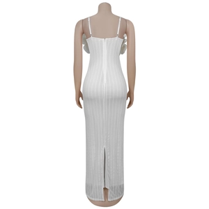 Detail view of the white ribbed maxi dress featuring a back zipper and ruffled armhole trims