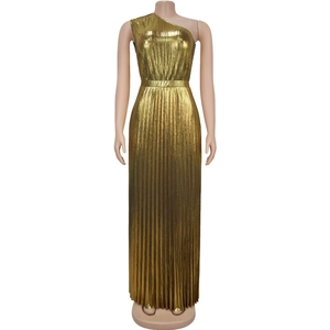 Detail of elegant gold one-shoulder maxi dress with metallic pleats and textured fabric