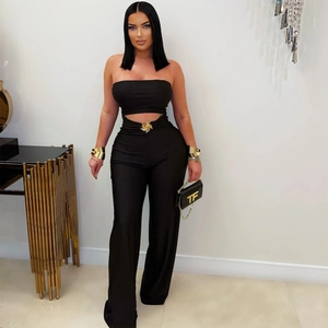Women's black slim fit tube top and wide-leg jumpsuit with gold metal ring detail