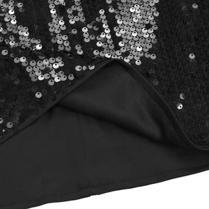 Vue macro de paillettes noires et argentées avec doublure douce et coutures soignées