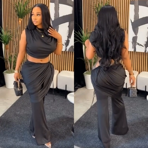 Detailed front and back view of a black sleeveless crop top with flared trousers set